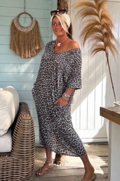 Lurex Jurk Leona Luipaard met Licht Blauwe Basis en Strik.
