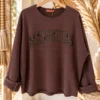 Sweater Malou Manhattan, Donker Bruin.